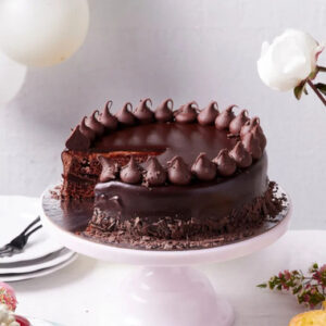 Read more about the article Classic Chocolate Ganache Celebration Cake