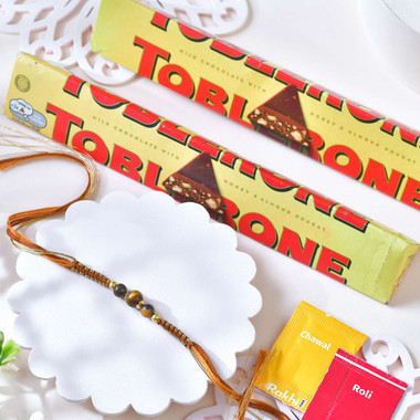 You are currently viewing Classic Beads Rakhi Combo with Toblerone Chocolates