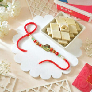 Read more about the article Krishna Bansuri Rakhi With Gourmet Hamper