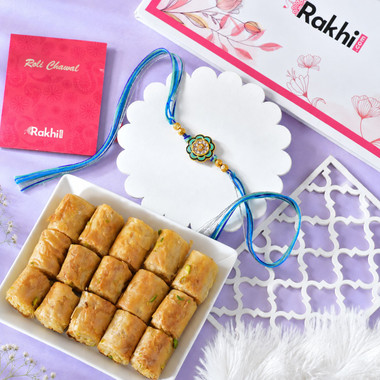 You are currently viewing Floral Shaped Rakhi With Blue Thread