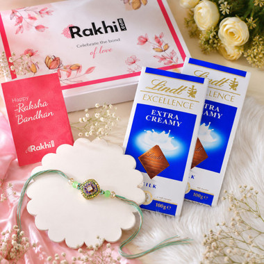 Read more about the article Krishna Bansuri Rakhi With Gourmet Hamper