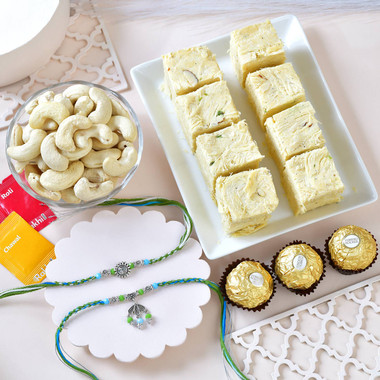 You are currently viewing Designer Rakhi Gift Hamper with Soan Papdi, Cashews & Ferrero Rocher