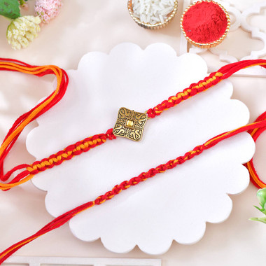 Read more about the article Traditional Red-Orange Designer Rakhi Set