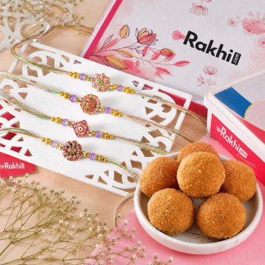 You are currently viewing Elegant Multicolor Traditional Rakhi Set with Besan Laddoo