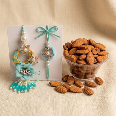 Read more about the article Blue and pink floral design Rakhi With Dry Fruits