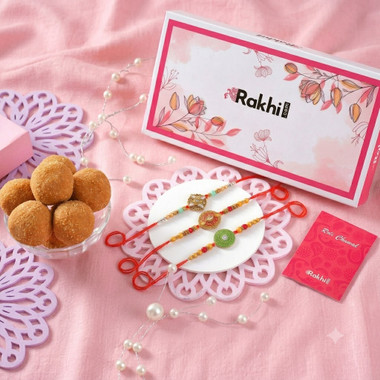 You are currently viewing Designer Rakhi Trio with Besan Laddoo